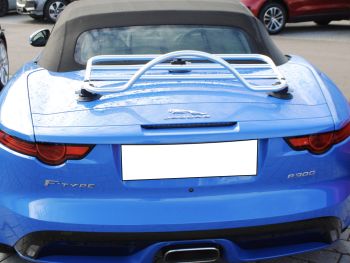 bright blue P300 jaguar f type convertible with a revo-rack pa luggage rack fitted photographed from the rear
