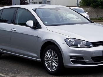 blue vw gold hatch with a 3 bike rack fitted 